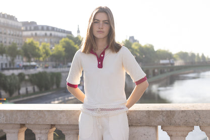 Polo écru en maille détail fushia